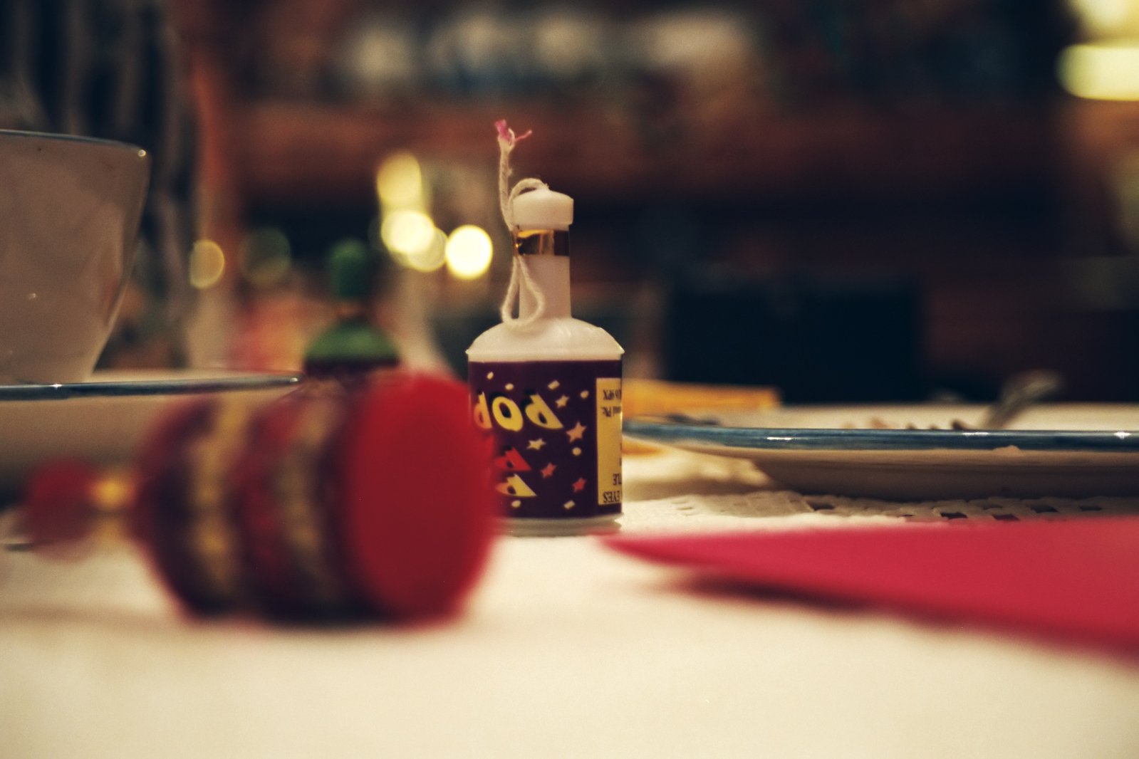 a canister of colorful liquid on a table