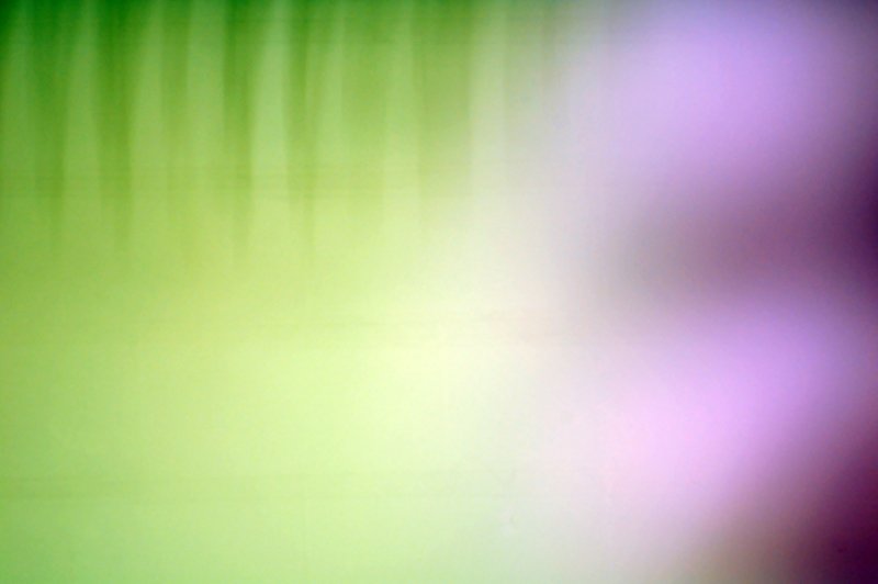 green and purple background with an interesting blur
