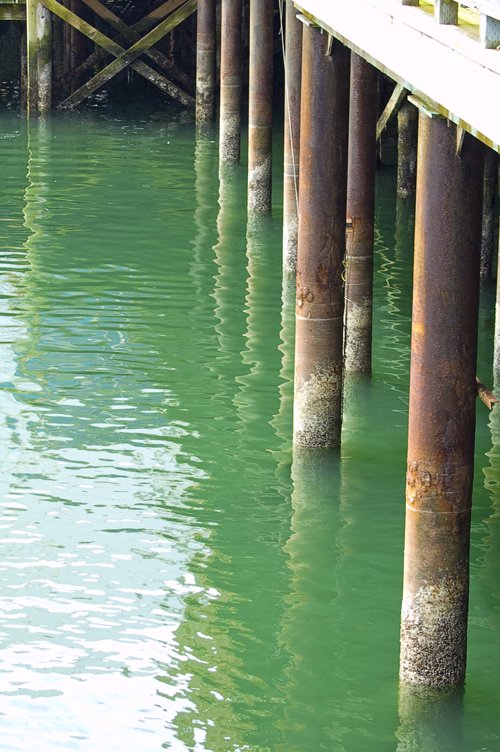 the view from under a bridge of water