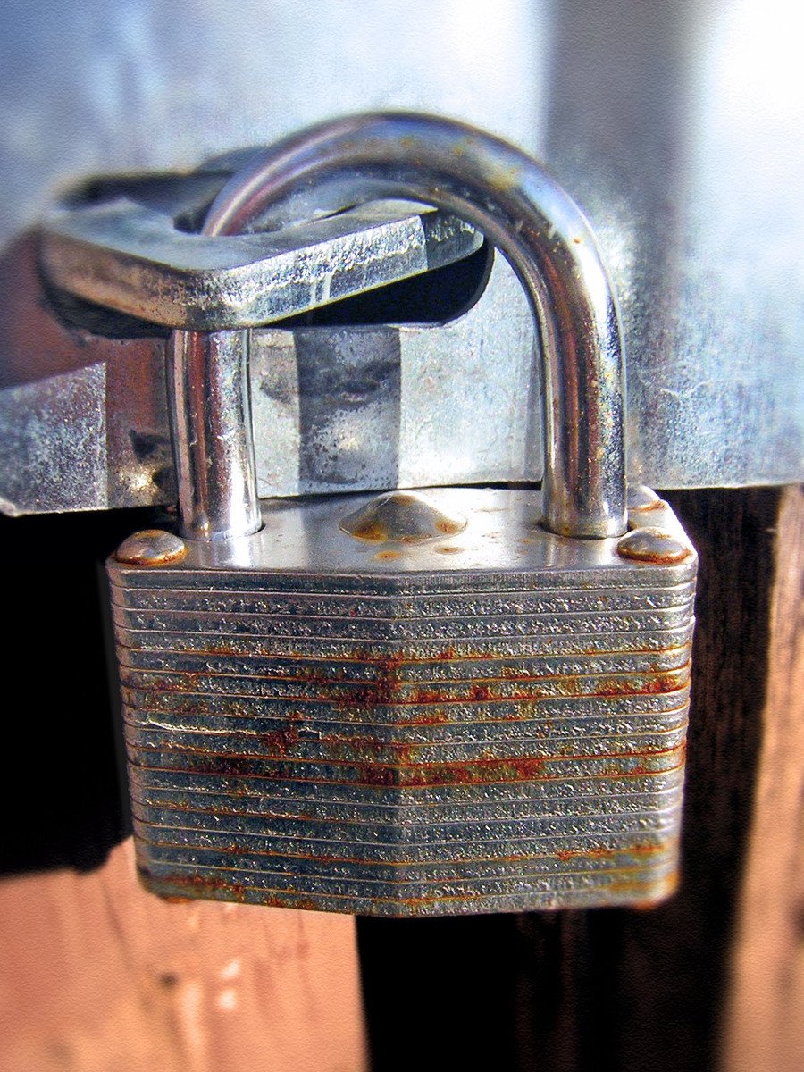 a large padlock on the end of a door
