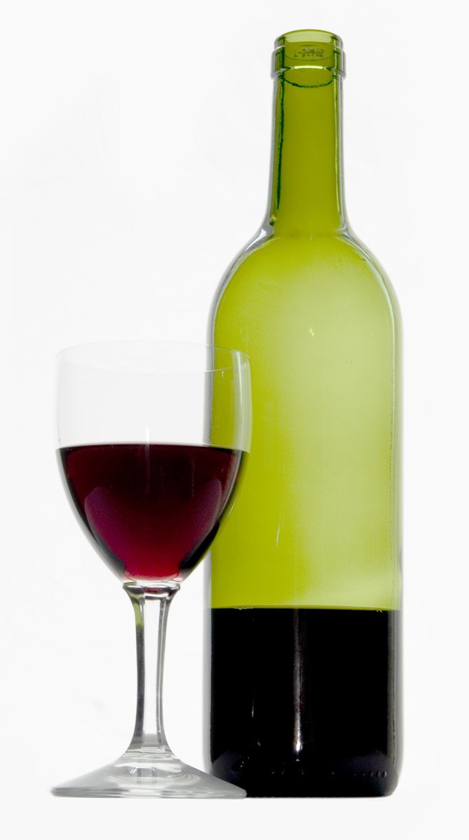 a glass and bottle of wine with one half full