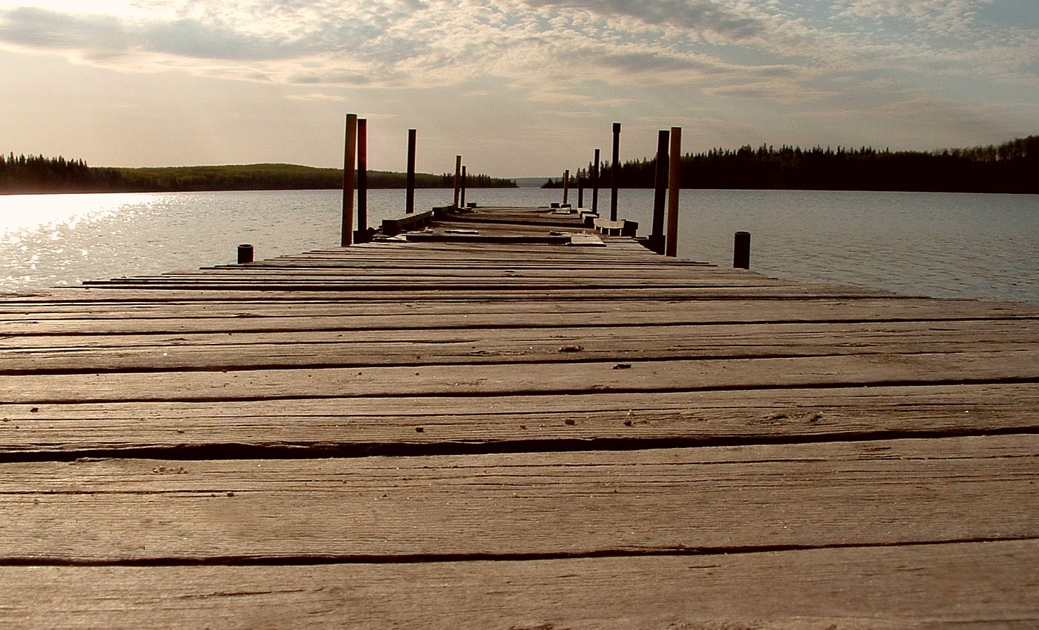 a dock that is built on a lake shore