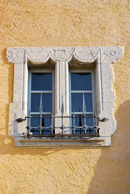 a very nice looking window on the side of a building