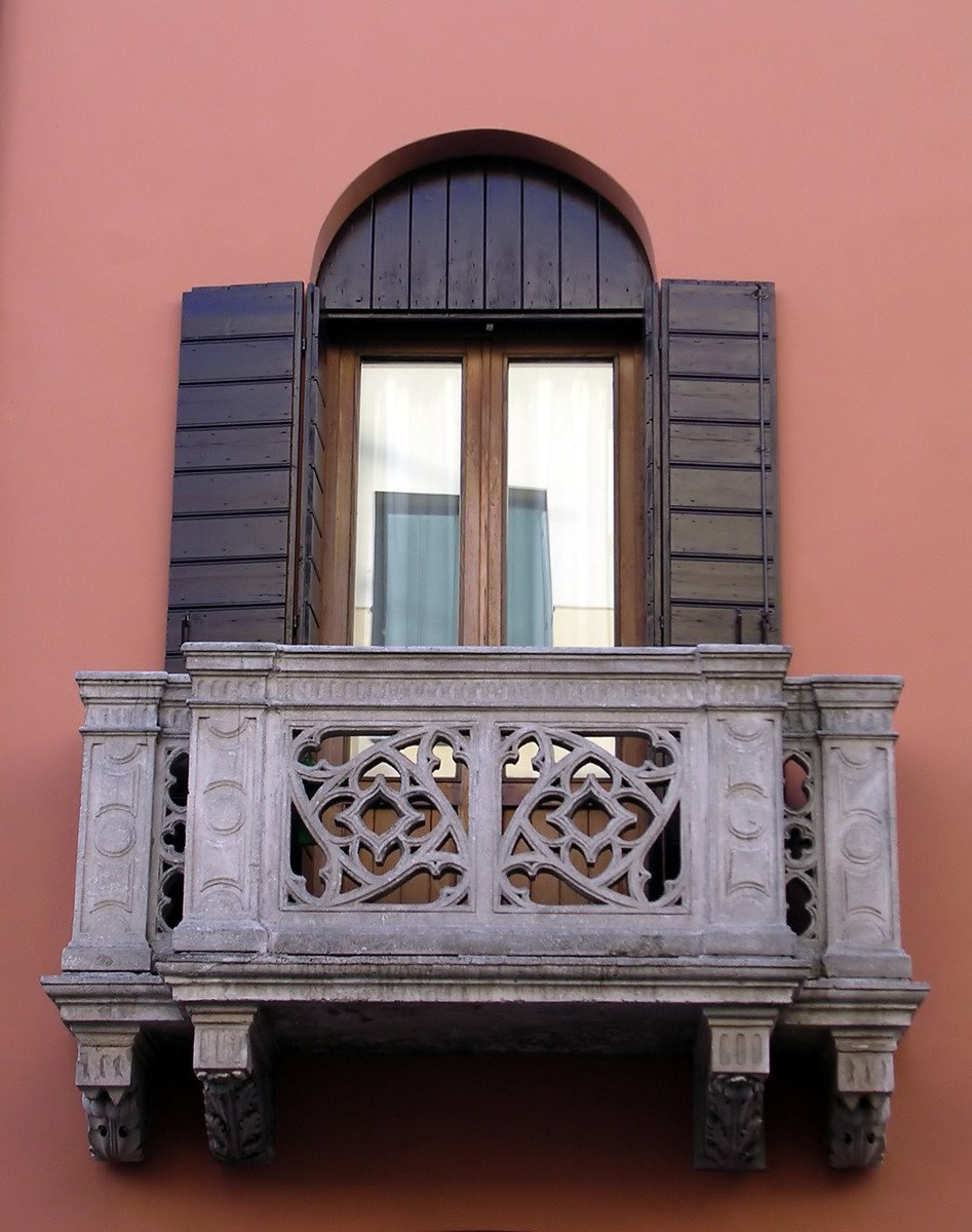 a balcony has ornate balconies on the balcony