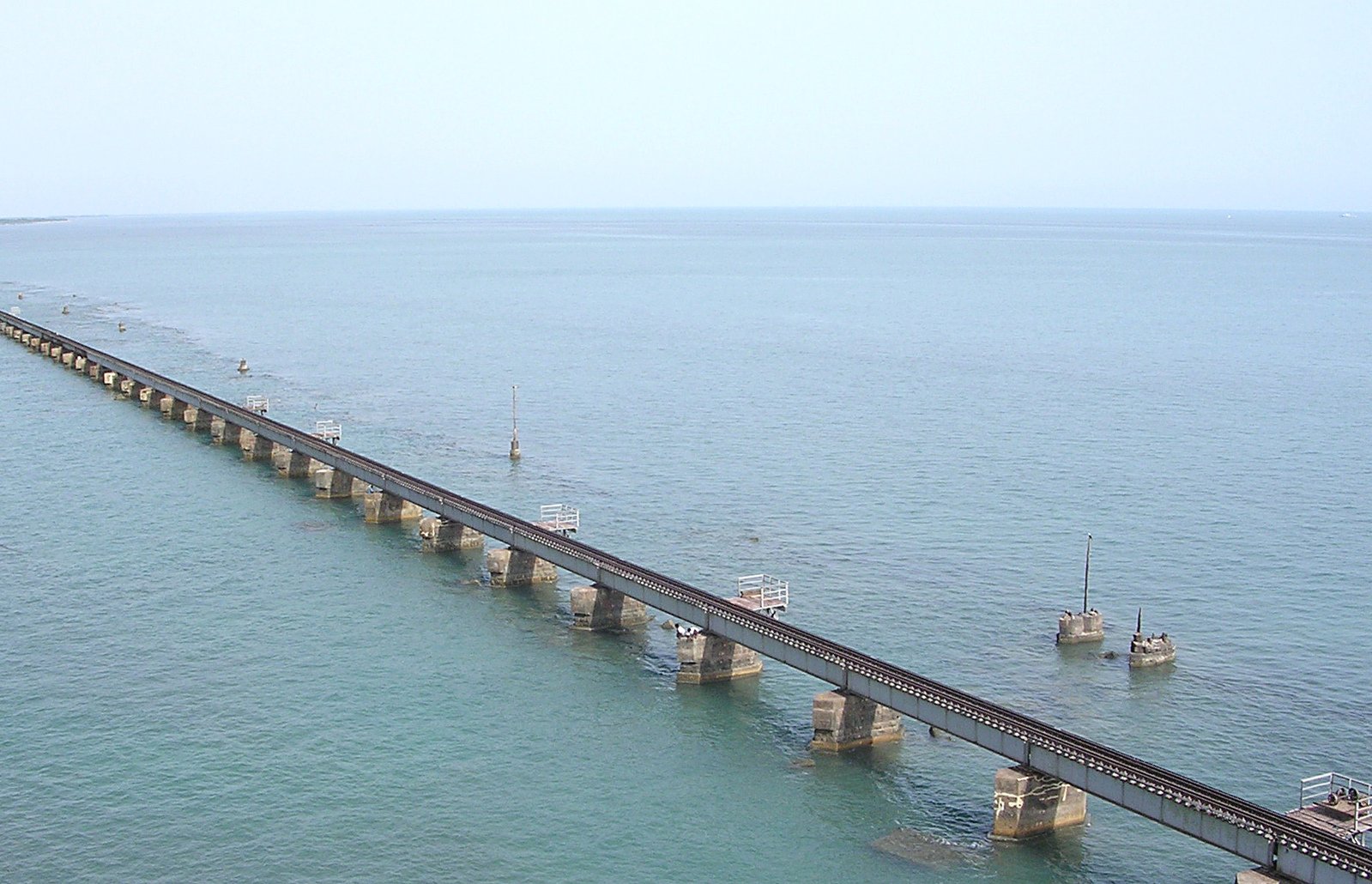 the bridge is connecting two ships to cross a high body of water