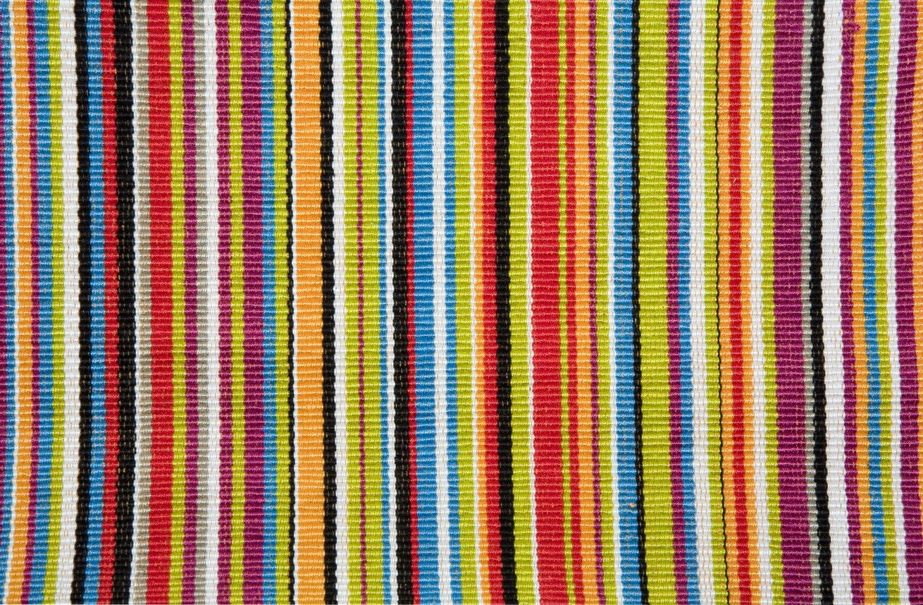 a piece of cloth with lots of different color