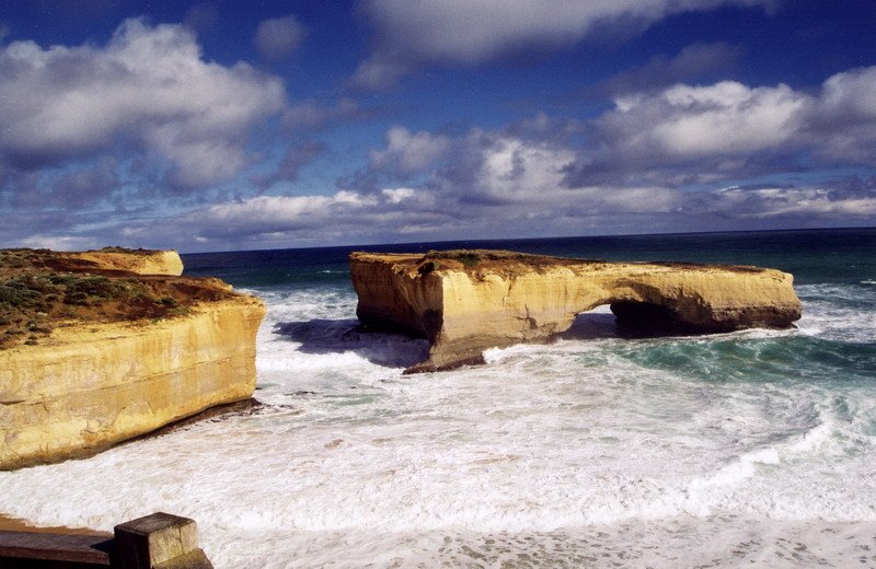 the ocean with some rocks in it