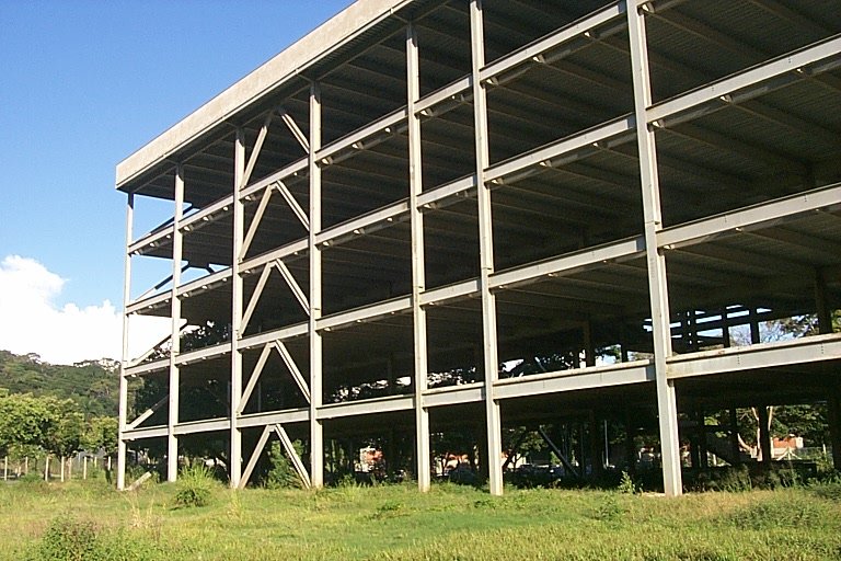 a view of an outdoor arena from the grass