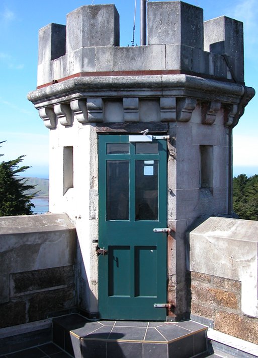 a door is on the tower that is located