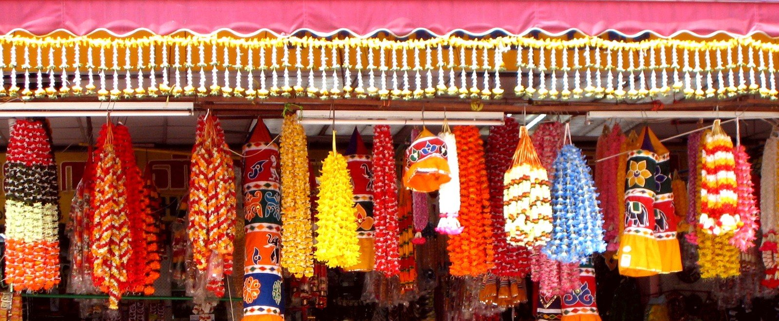 a street vendor displays brightly colored candy canes