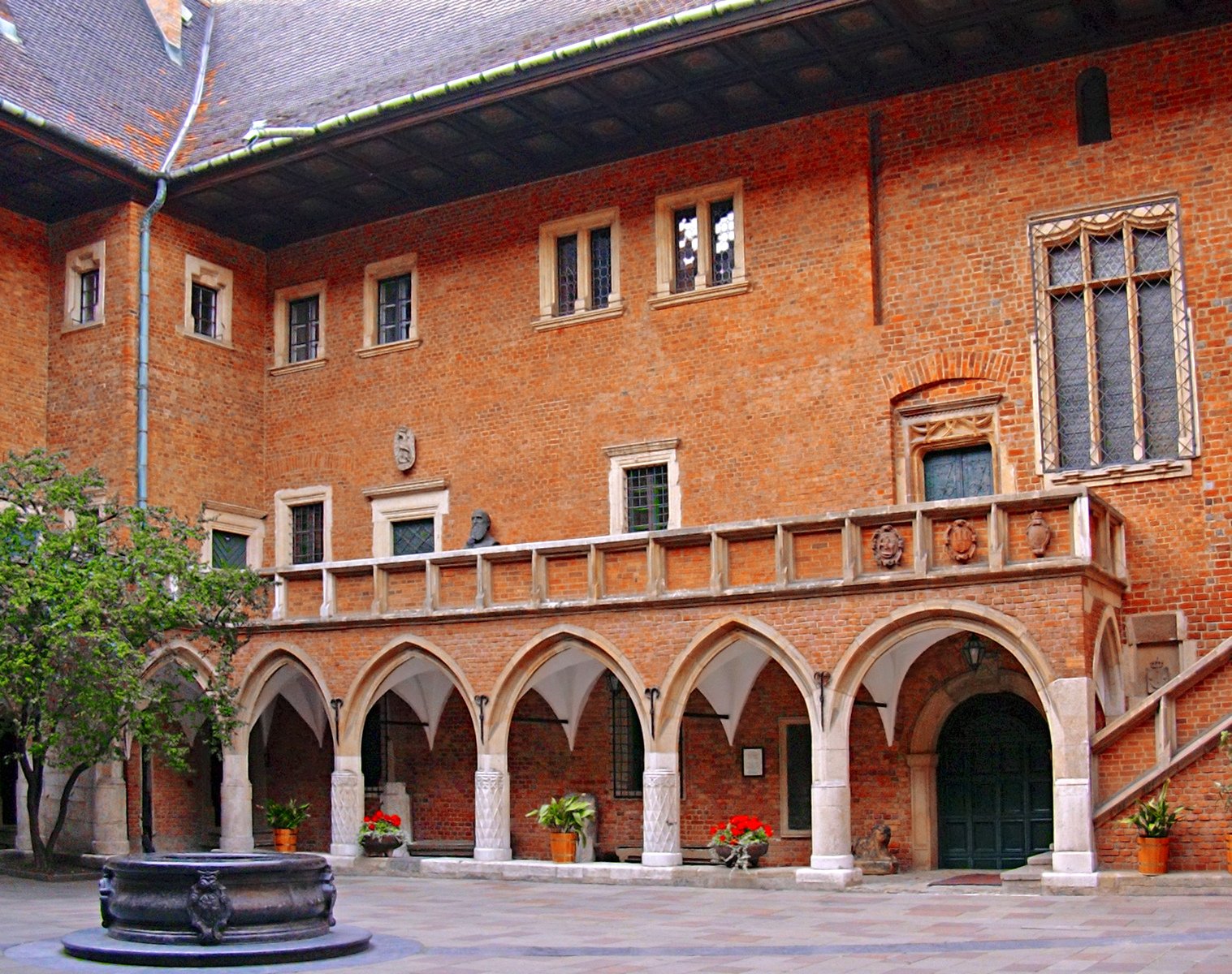 an ornate courtyard in the historic building with arches