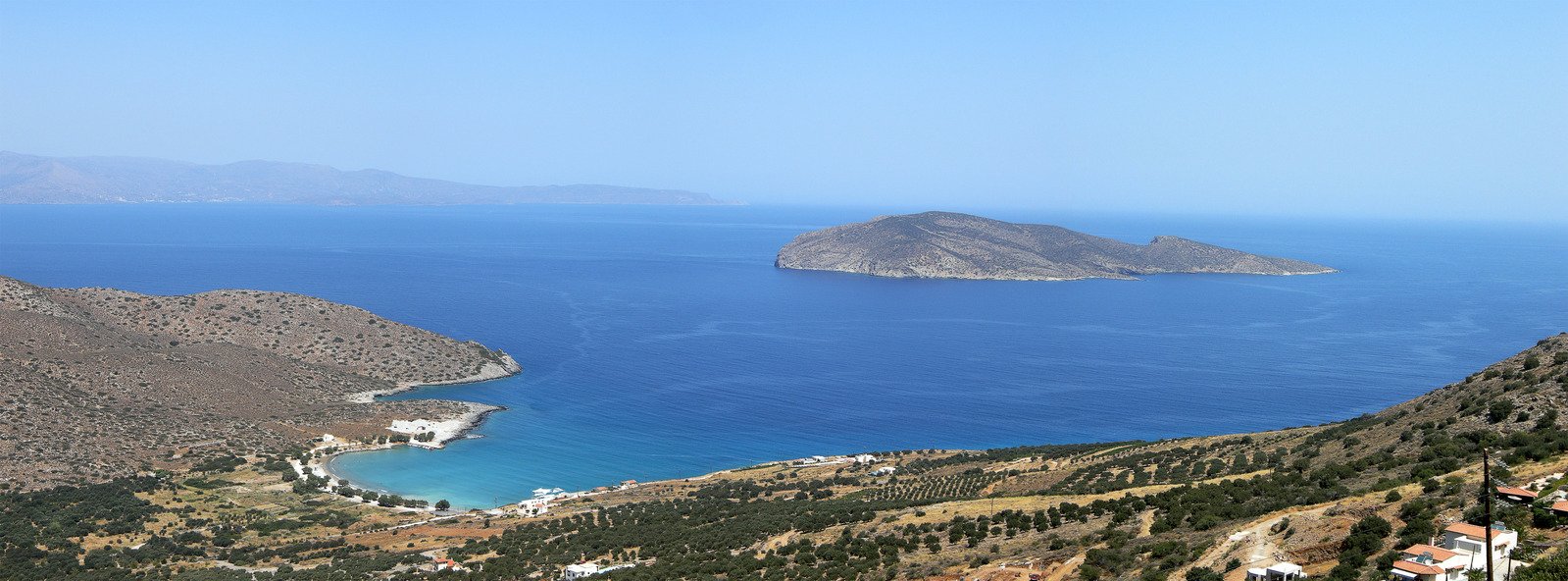 a view of a bay from atop a hill