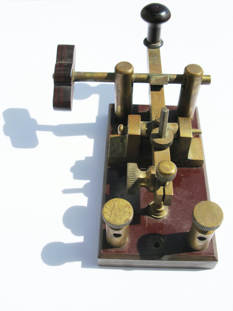 a miniature model of a mechanical contraption that uses multiple gauges and small parts