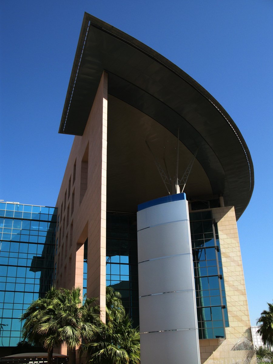 an outside picture of a large building with round shapes