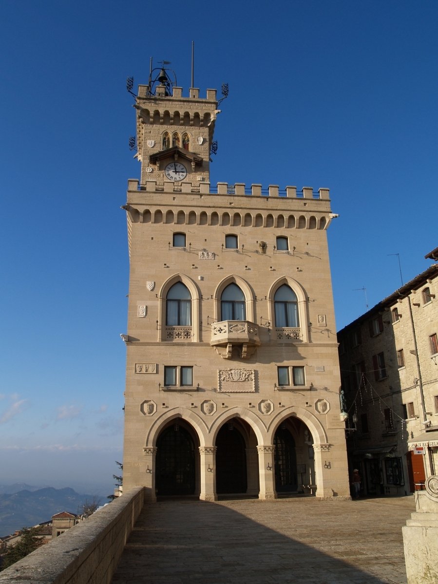 a stone structure with two towers next to one another