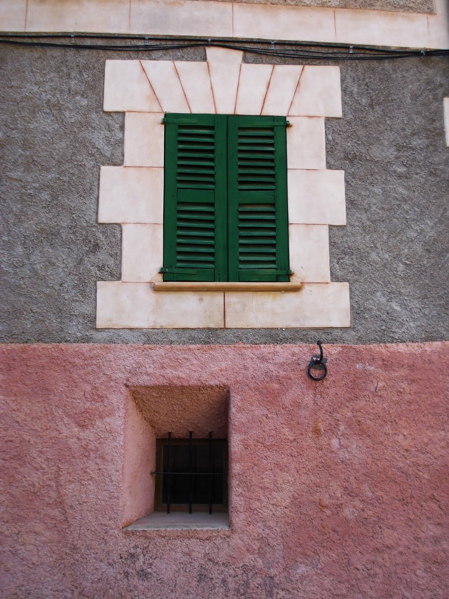 an open window on the side of a building