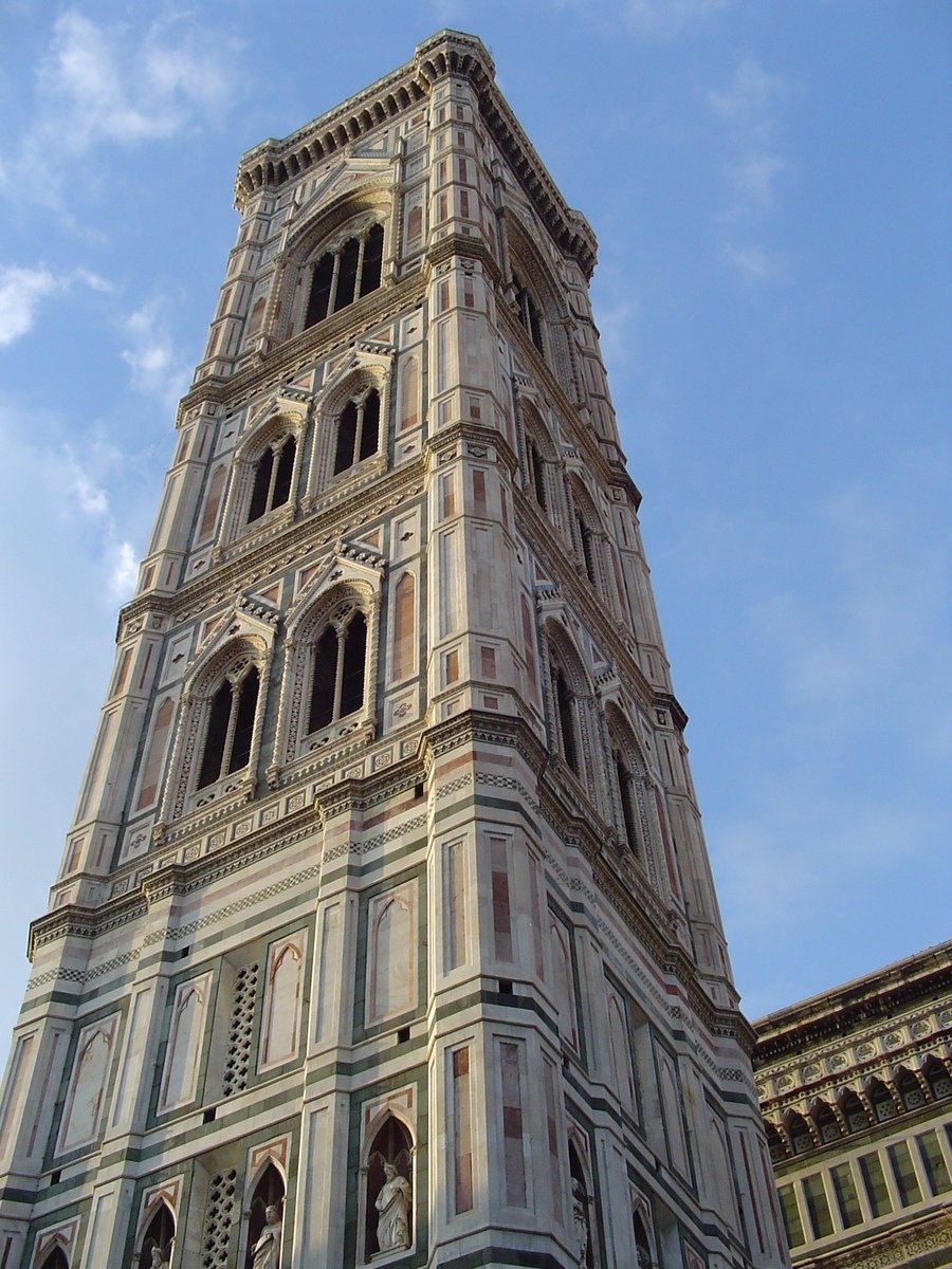 a large building with a tall tower on the top