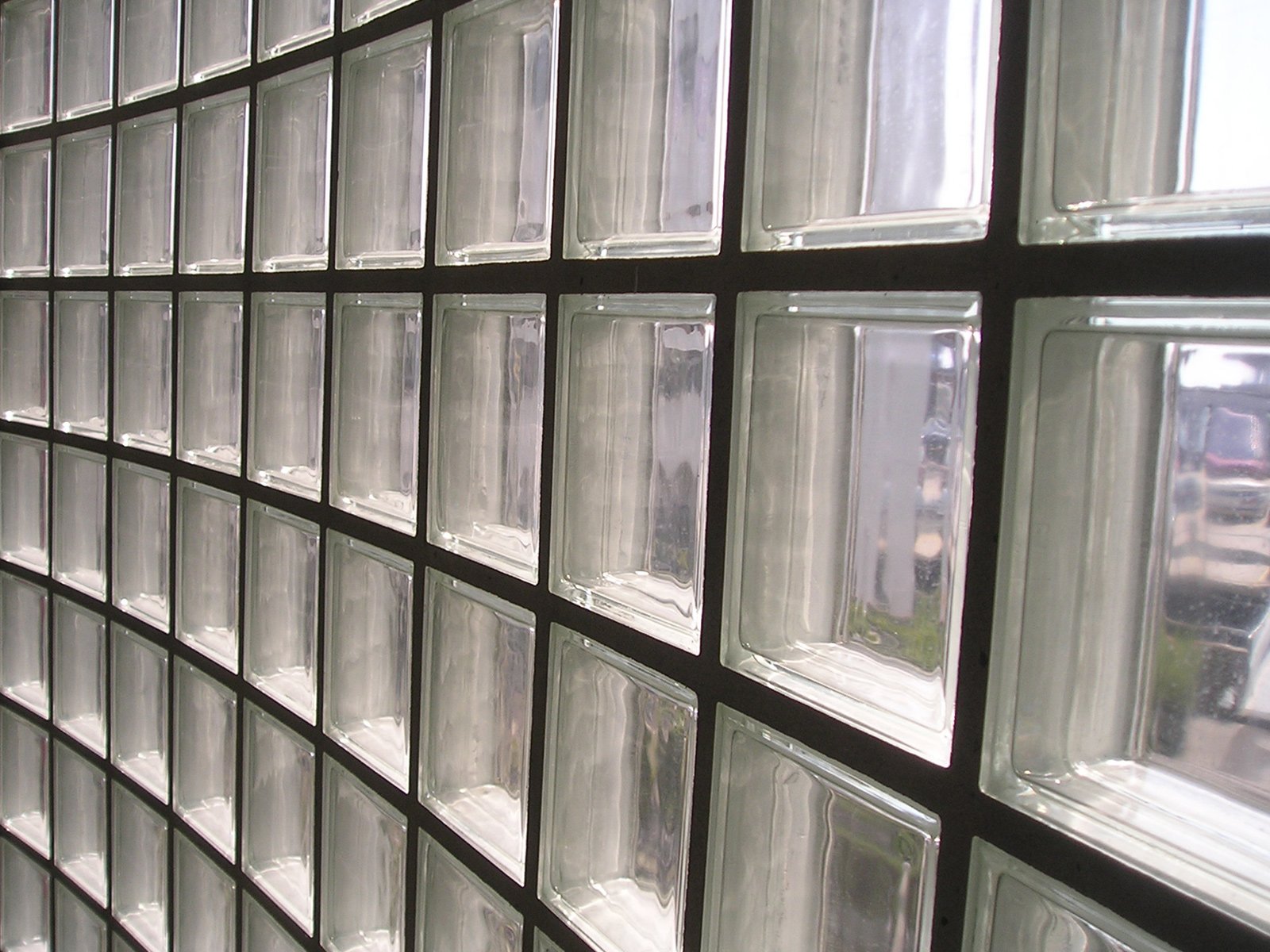 a line of glass blocks is shown as if they were stacked together