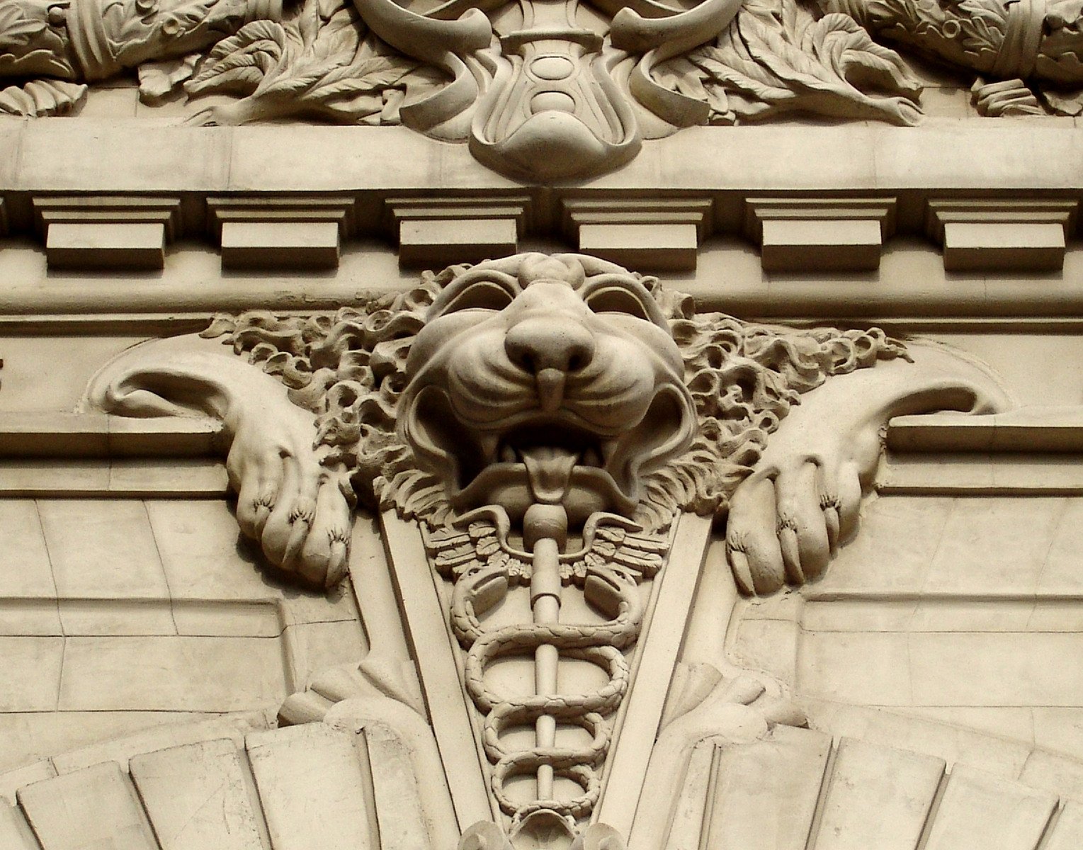 an elaborate stone building with ornate architectural carvings