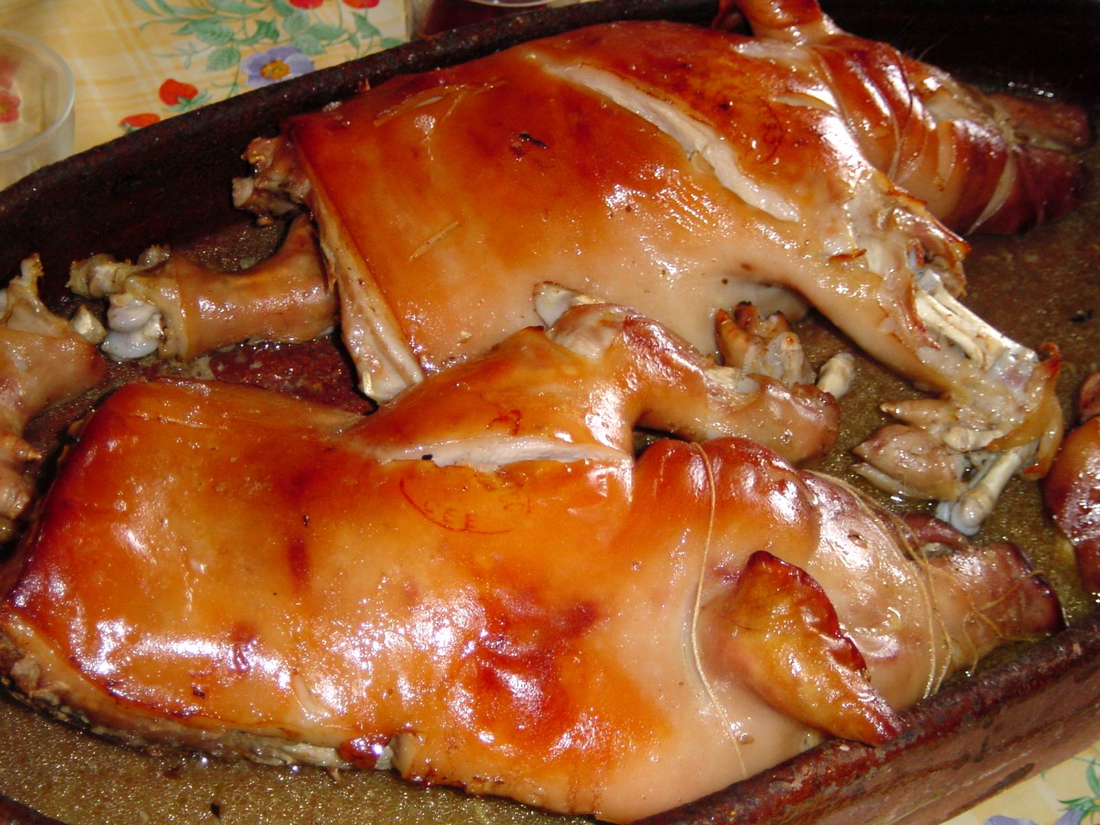 a close up view of some meat cooking in the oven
