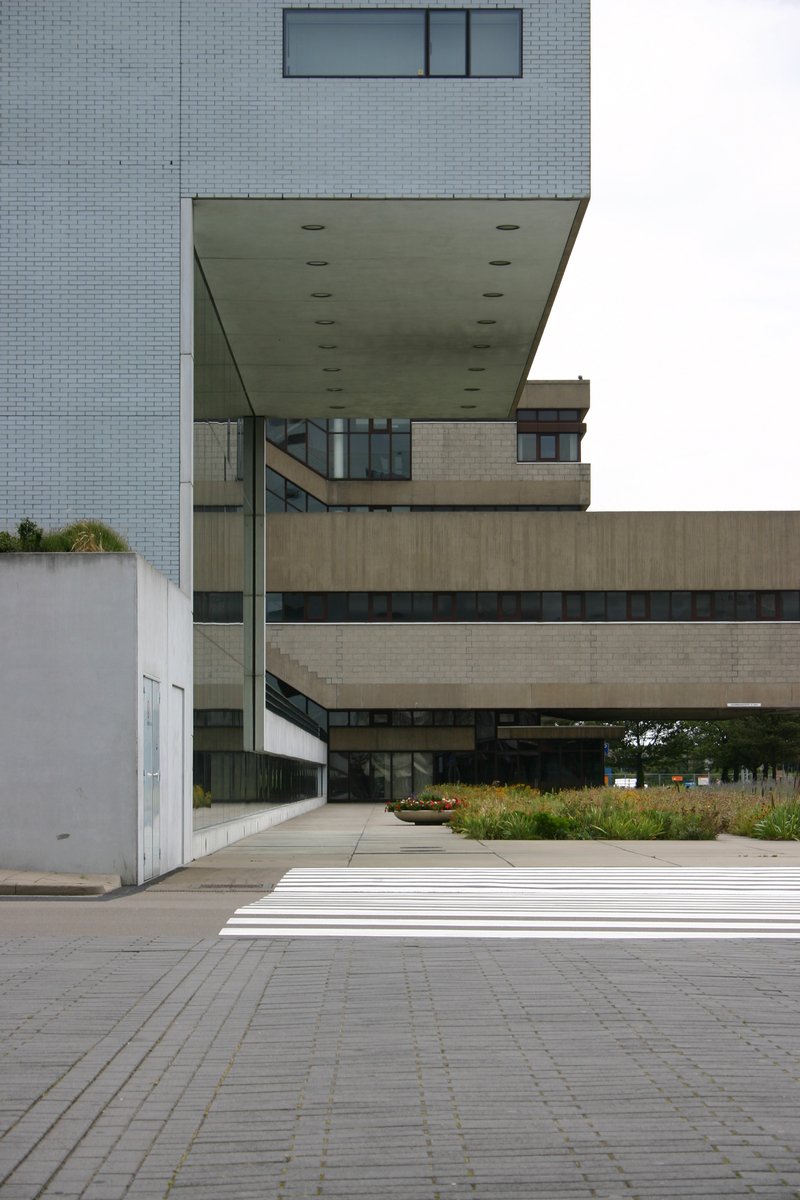 a building has many plants growing on top of it