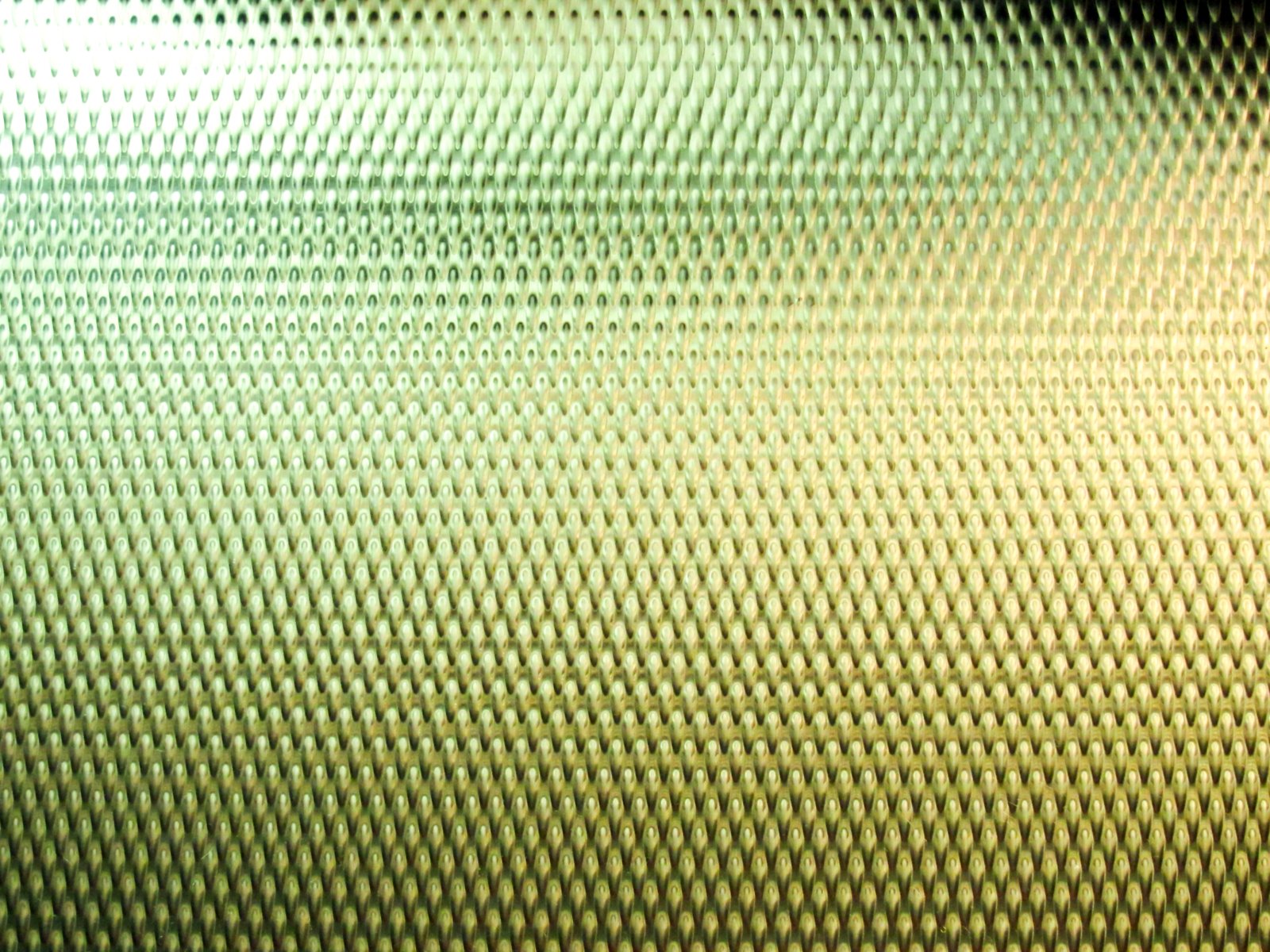 a blurry po of yellow and green colors