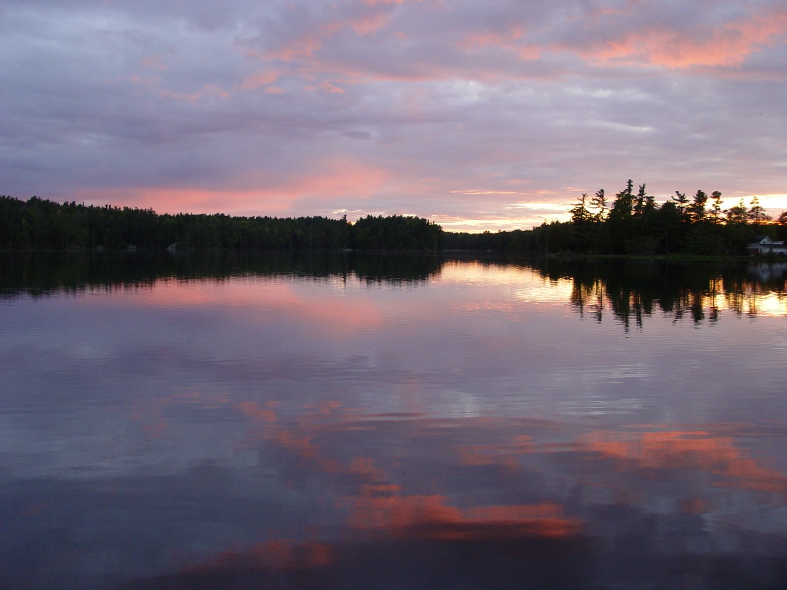 an image of the sunset at the lake