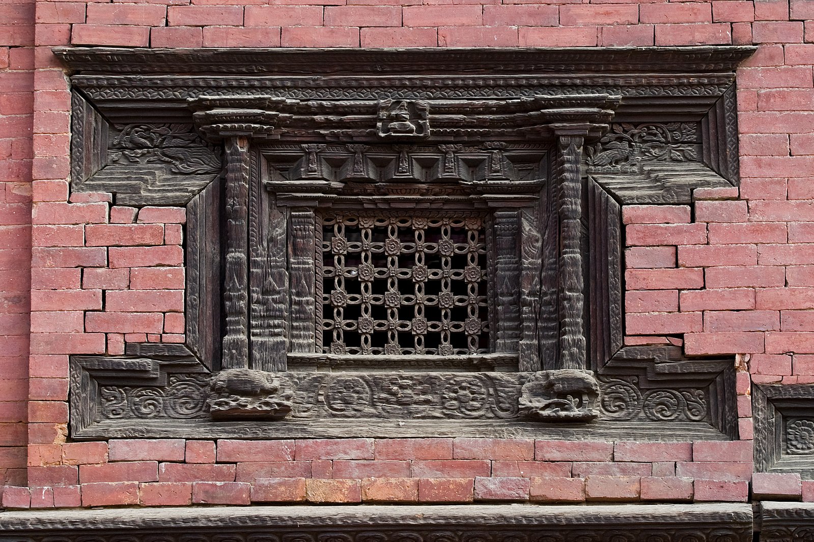 an old window on the side of a building