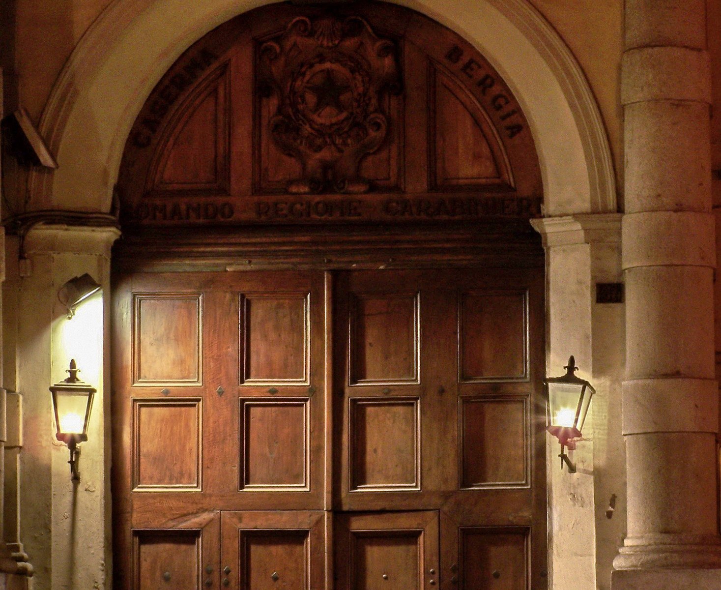 a large wooden door to a very old looking building