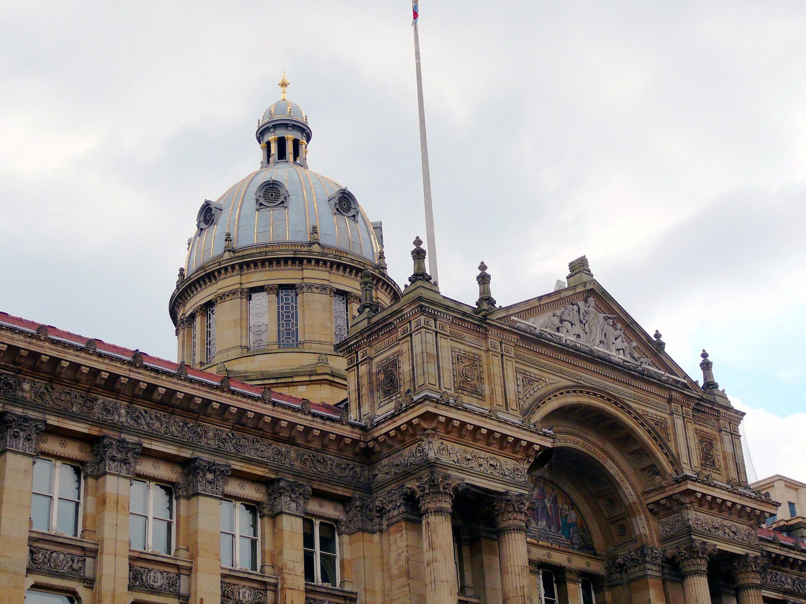 an old building that has a flag on top