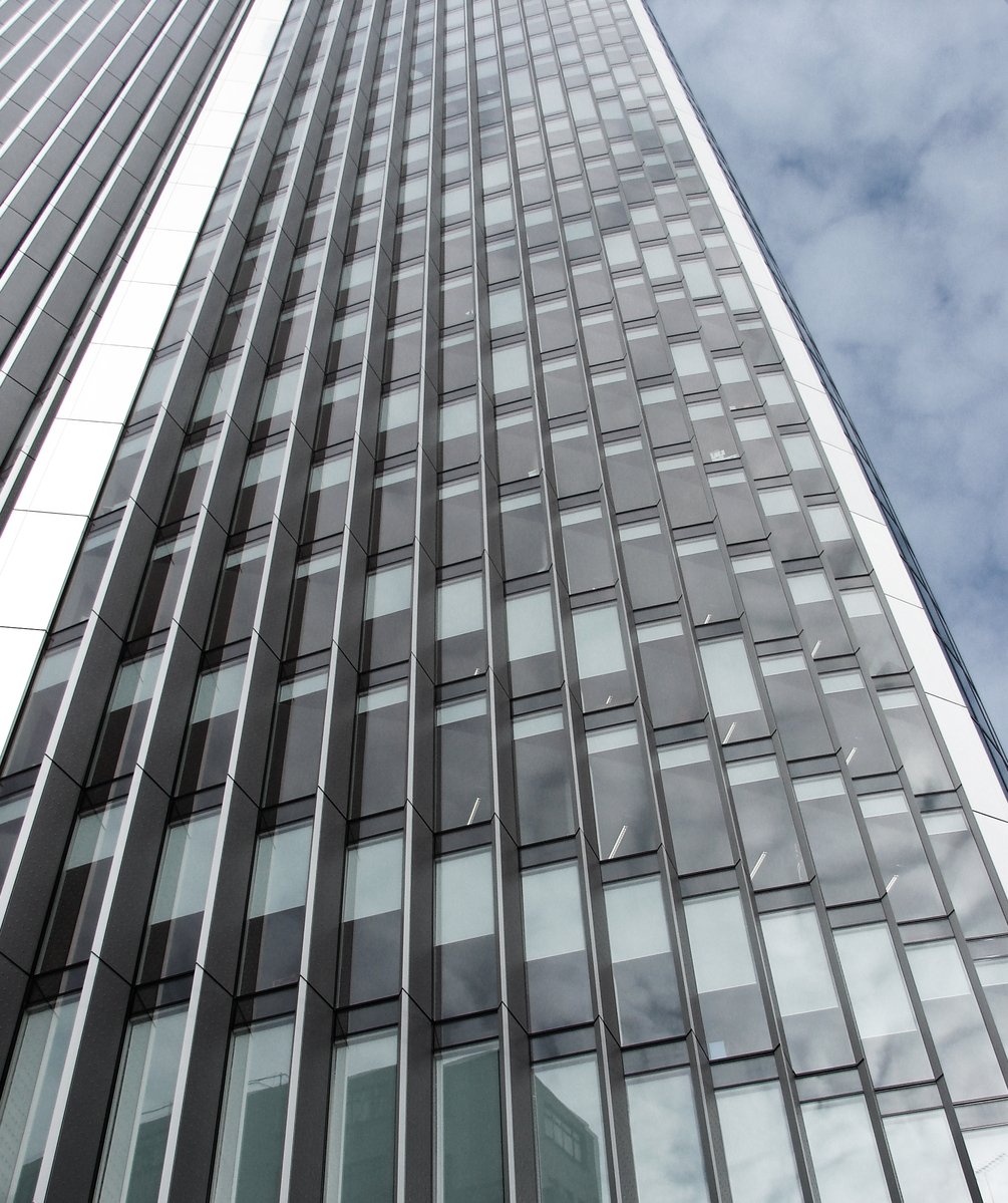 a large tall building with many windows