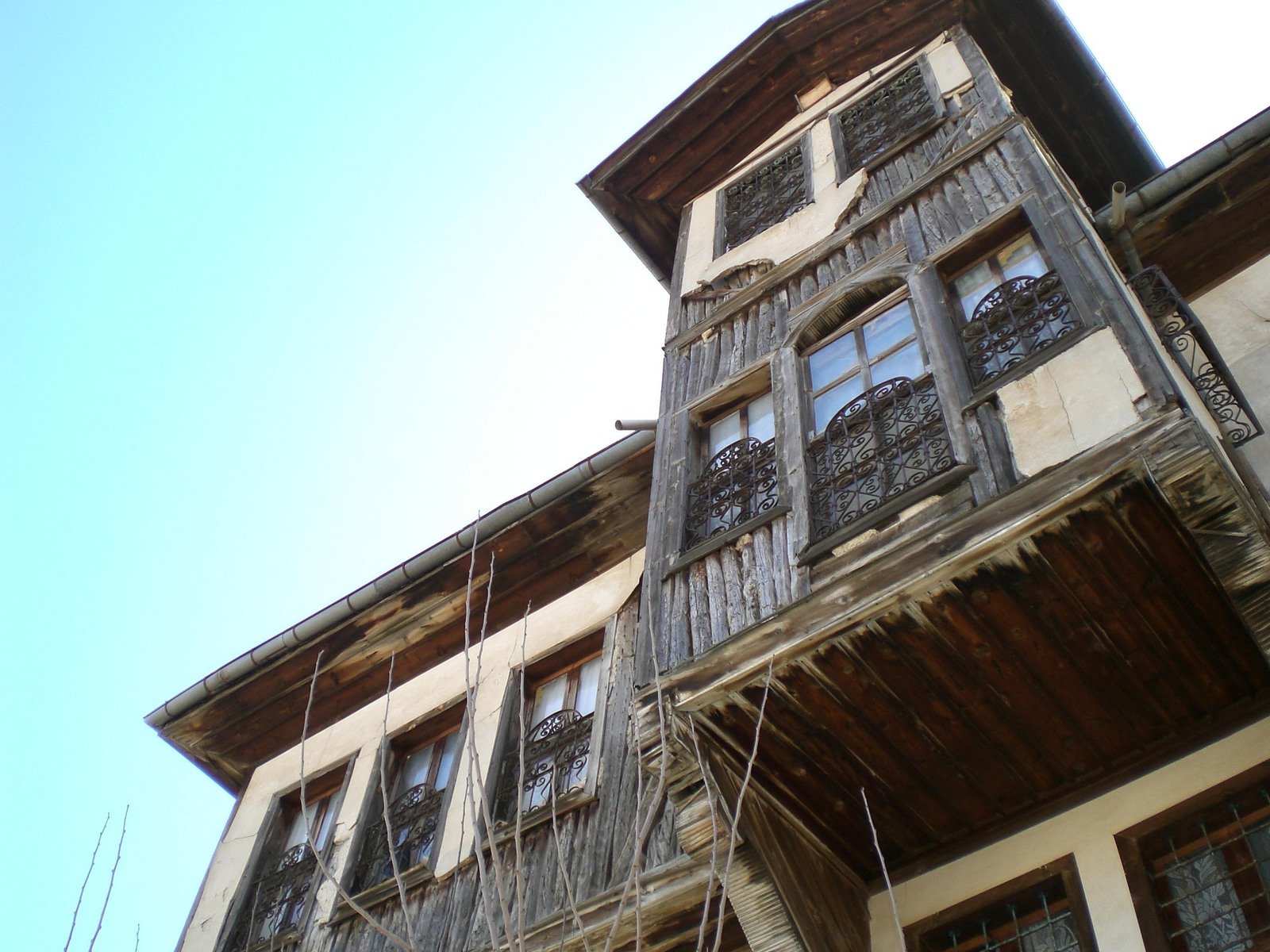 an old - fashioned windowed building with some strings attached