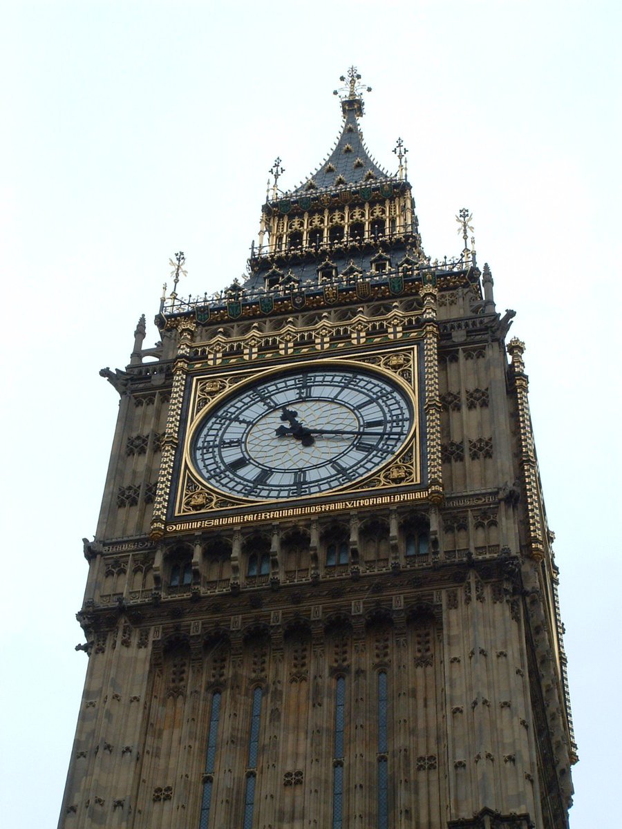 the big ben clock tower towering over the city of london