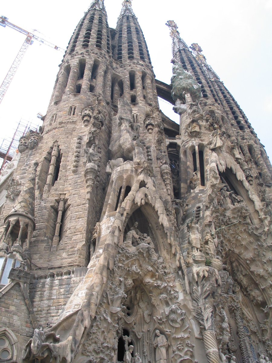 a tall tower sitting on the side of a building