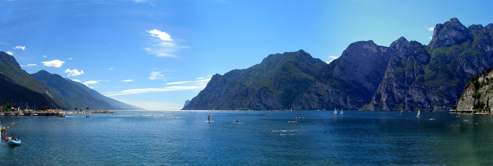 boats are floating on the water in the ocean