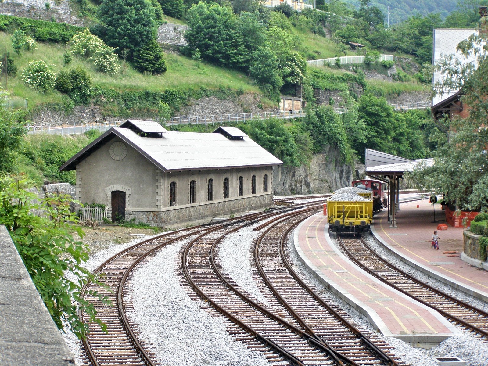 two train tracks at the end of a railway