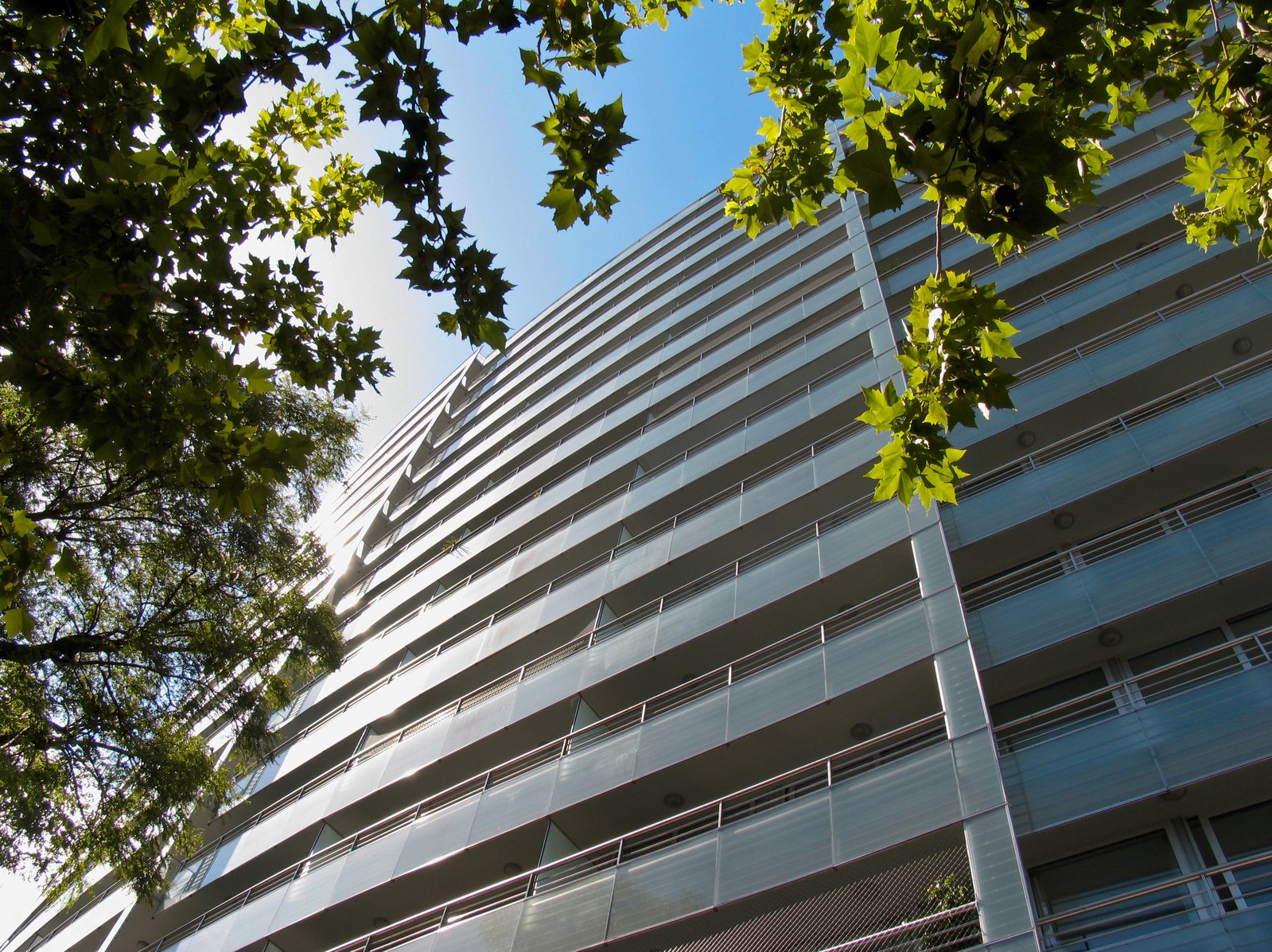 looking up at the facade of an office building