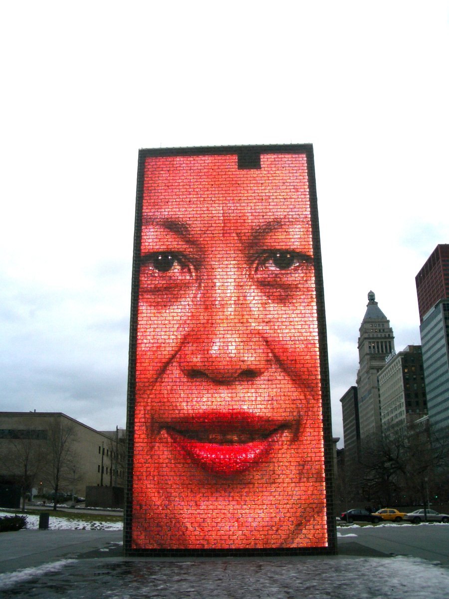 a poster that is made up of blocks of red lipstick