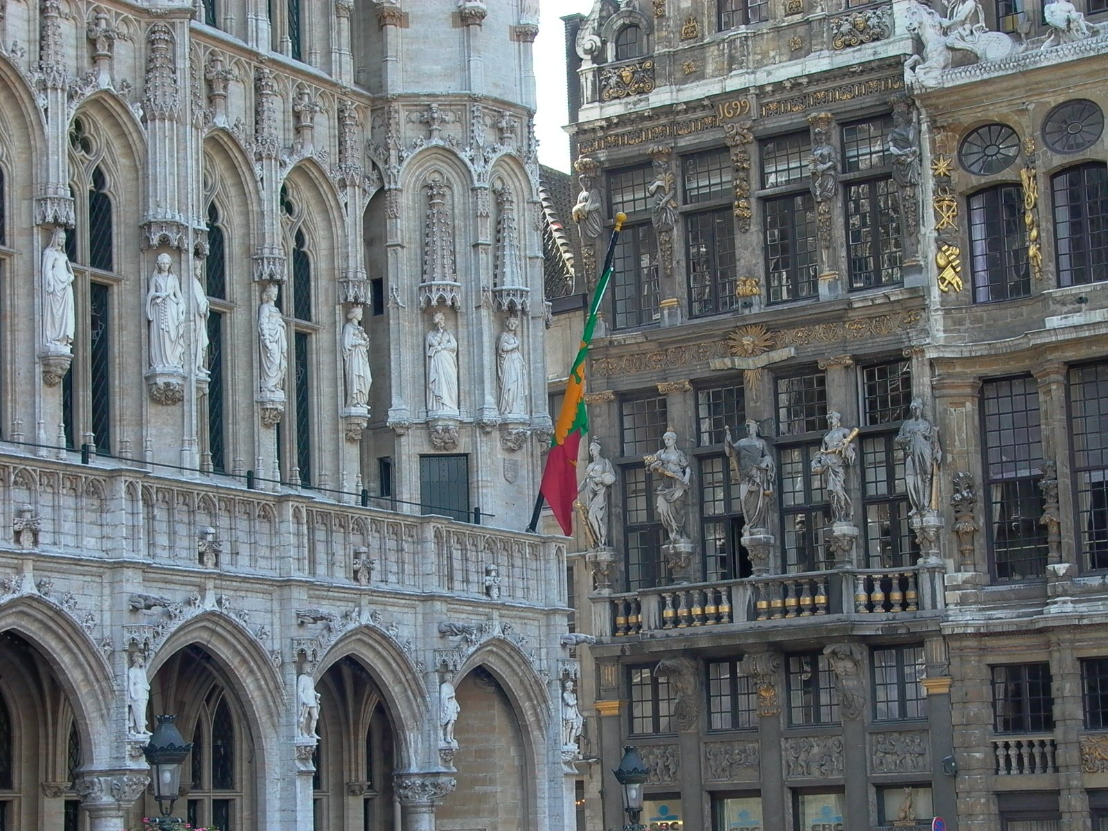 a man in front of a large cathedral building with lots of windows