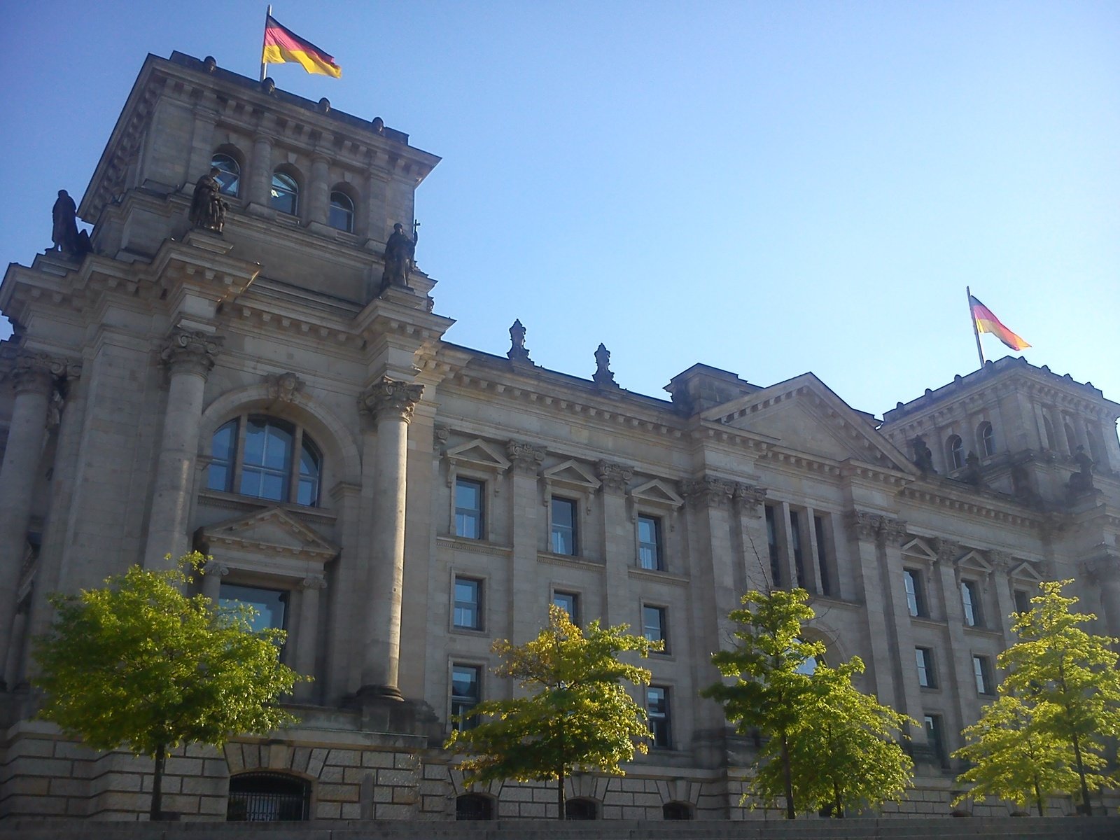 there is a large building with two clocks at the top