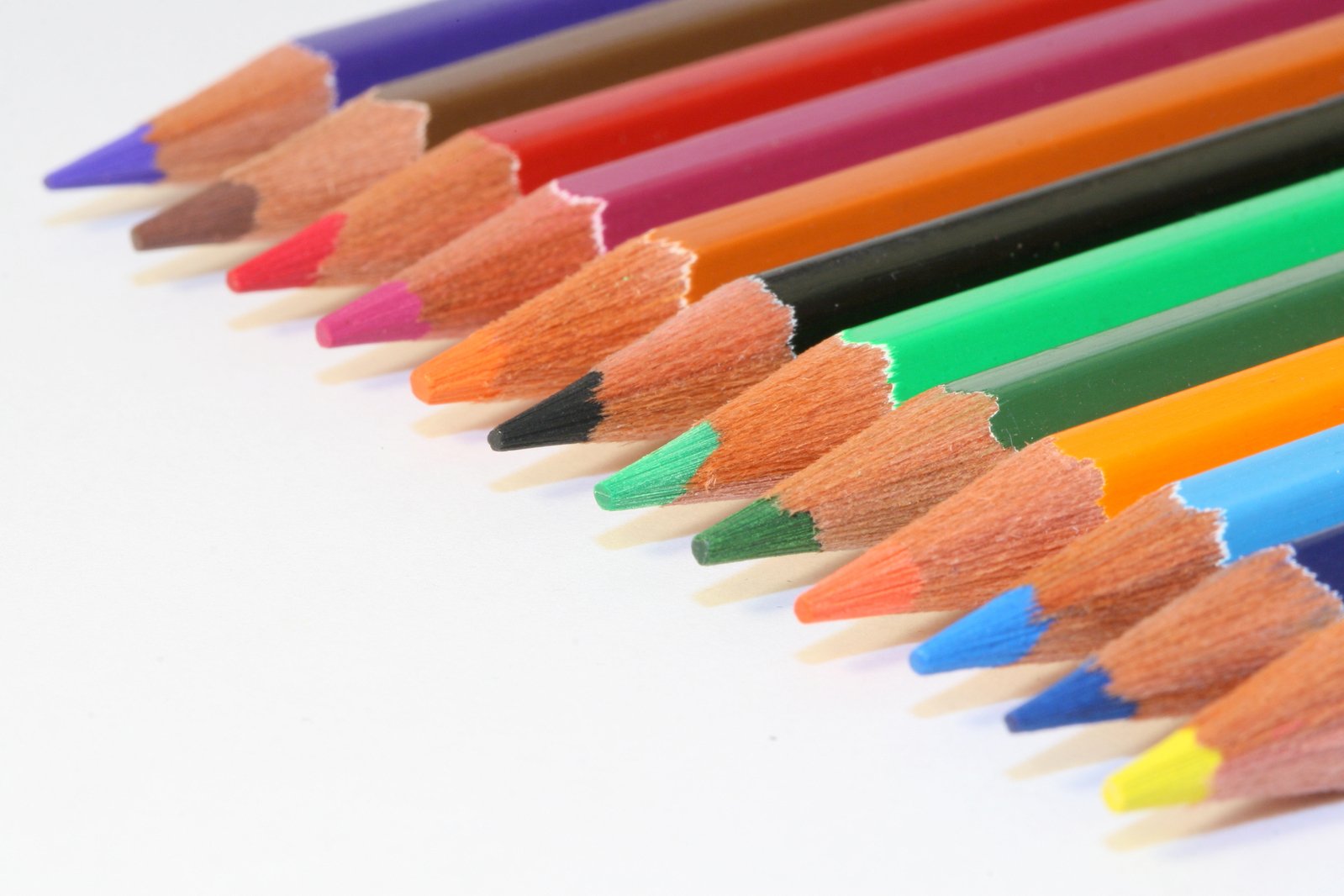 the colorful pencils are lined up neatly
