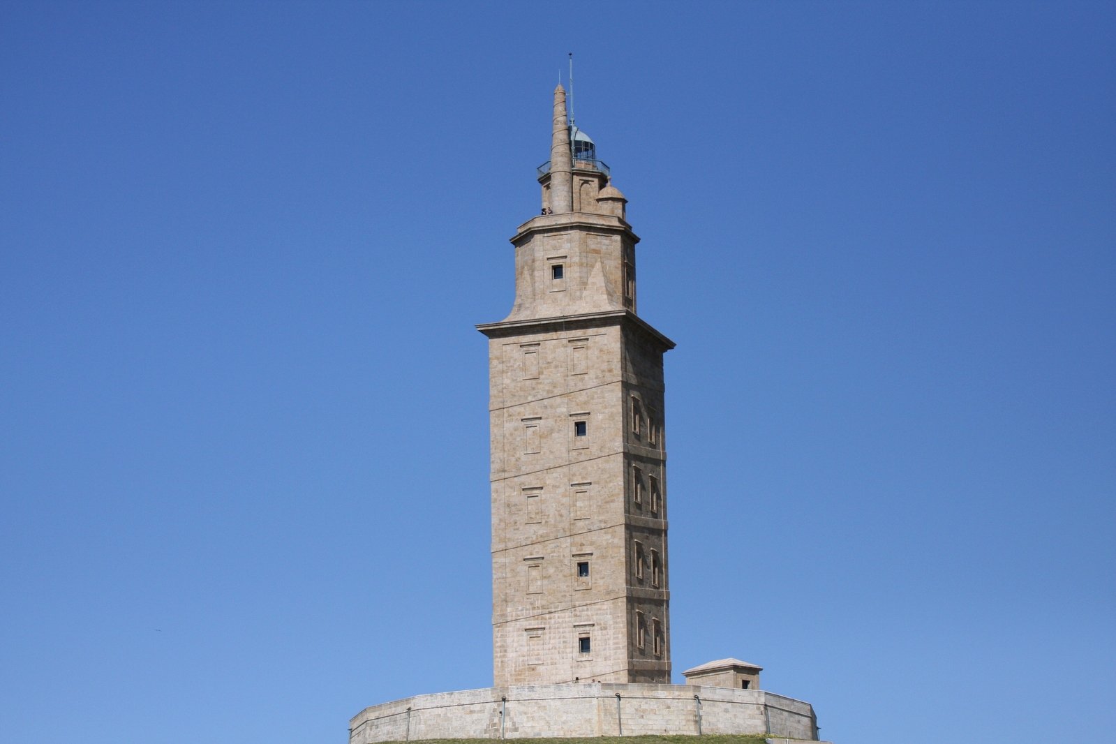 a tall stone tower towering above the ground