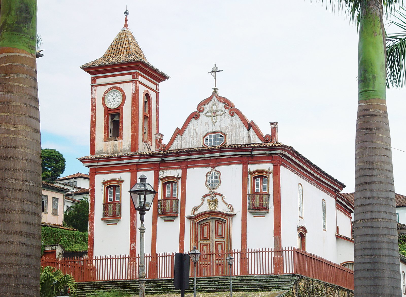 a very old building that is red and white