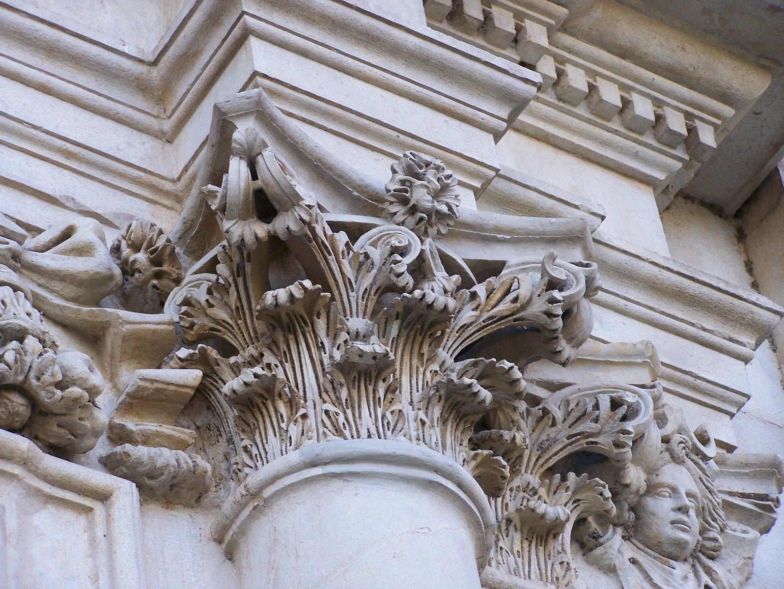 close up image of a gargoyle decoration on a building