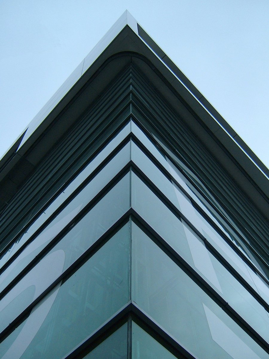 an extreme closeup s of a glass building