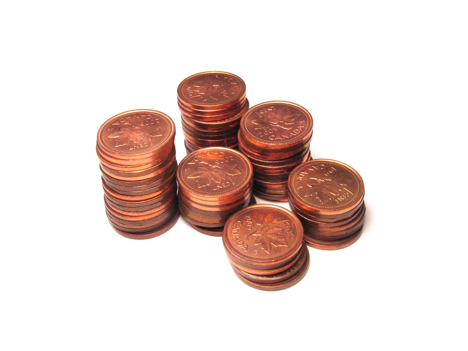 a stack of copper coins, over a white background