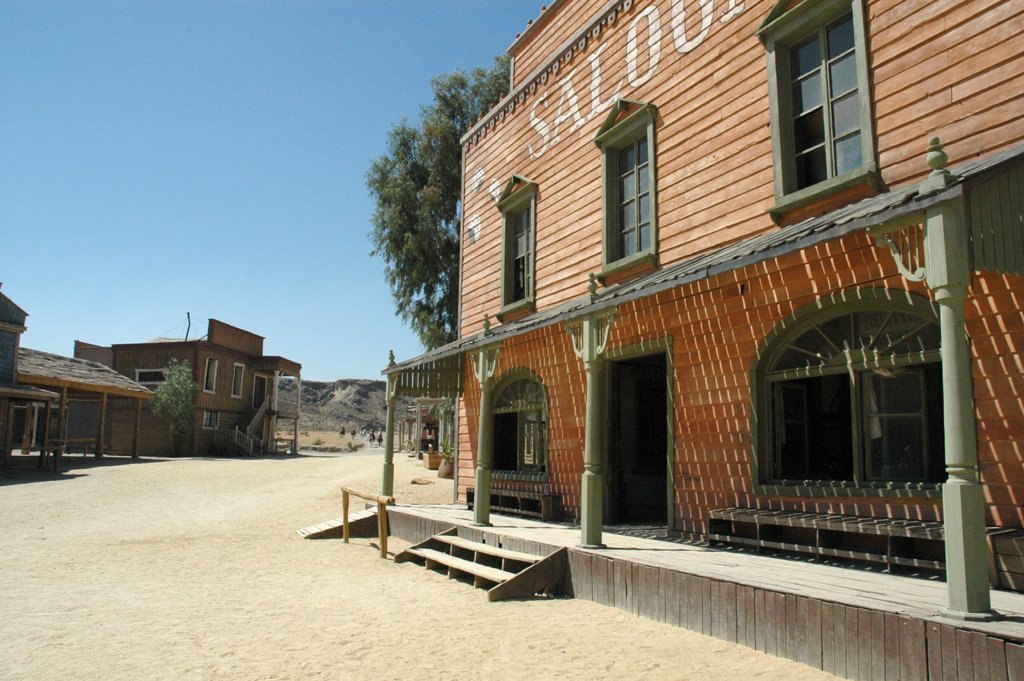 an old western town has been restored into a restaurant