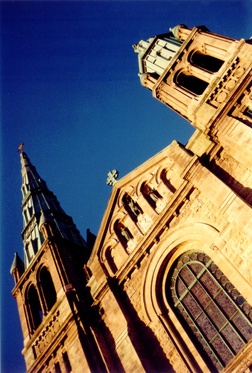 an old church steeple with clocks on it