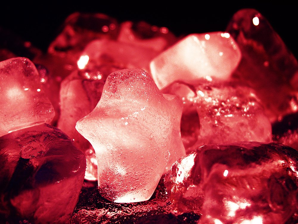 a close up view of various crystals on black