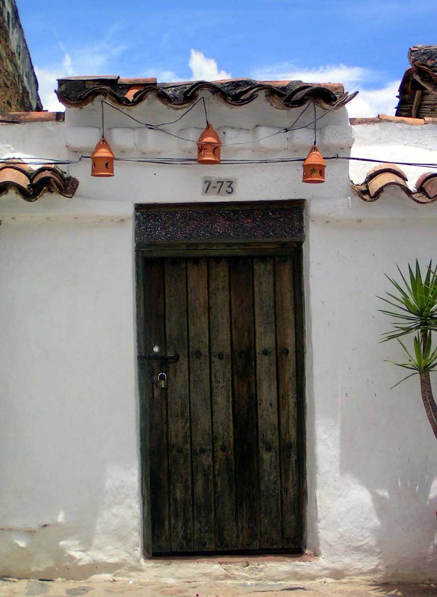 a door is open at the entrance of a home